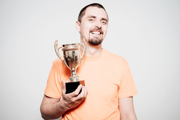 man with a golden cup