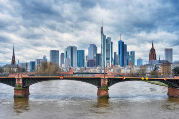 Obraz premium Frankfurt Main, Germany, skyline with dramatic clouds over the skycrapers