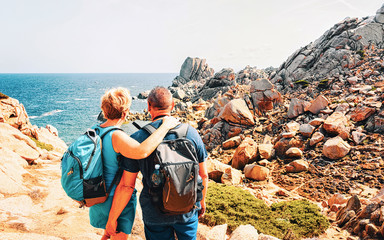 Couple at Capo Testa in Santa Teresa Gallura on Sardinia reflex