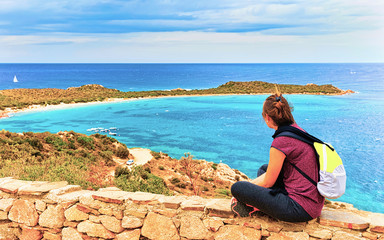 Girl at Punta Coda Cavallo seen from San Teodoro Sardinia reflex