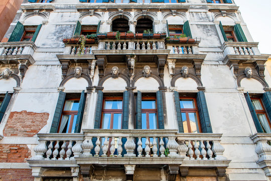 The decaying facade of the building