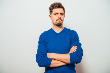 Portrait of a man arms folded