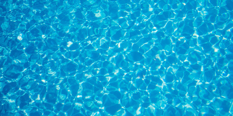 Abstract ripped water in swimming pool with blue radial texture ripples background