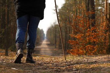 woman walking in spring forest