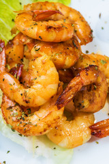 Fried langostins in a white plate