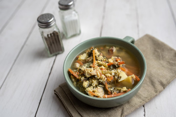 Fresh green sorrel soup, Russian special egg drop soup with vegetables, healthy soup