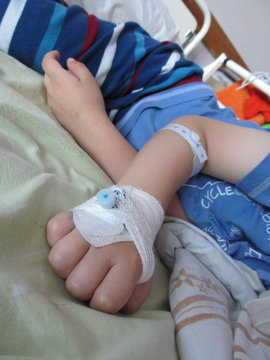 Sick child in hospital with venflon