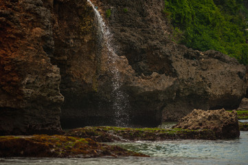 Beach and beautiful views of the cliffs, splashing waves and nature.