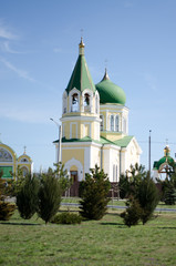 Christian monastery. Church with green domes.