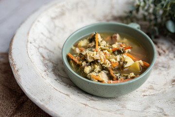 Fresh green sorrel soup, Russian special egg drop soup with vegetables, healthy soup