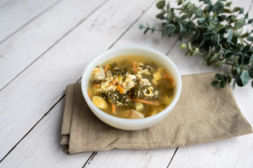 Fresh green sorrel soup, Russian special egg drop soup with vegetables, healthy soup