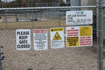 warning signs by a radio tower