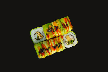Japanese food: Set of salmon sushi and rolls with salmon and eel