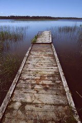 wooden bridge on the lake