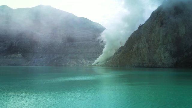 Aerial view of sulfur mine at the crater of Kawah Ijen volcano. East Java, Indonesia.