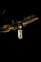 collar hanging on a hand