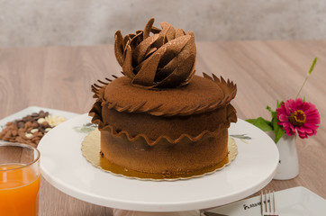 Birthday cake decorated with colorful sauce