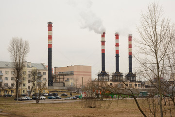 Fototapeta na wymiar Environmental pollution. Smoke from the chimney of a power plant.