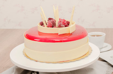 Birthday cake decorated with colorful sauce