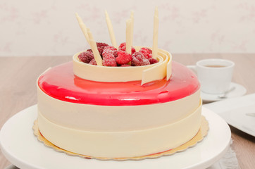 Birthday cake decorated with colorful sauce