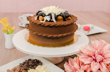 Birthday cake decorated with colorful sauce