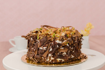 Birthday cake decorated with colorful sauce