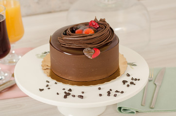 Birthday cake decorated with colorful sauce