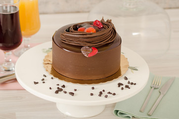Birthday cake decorated with colorful sauce