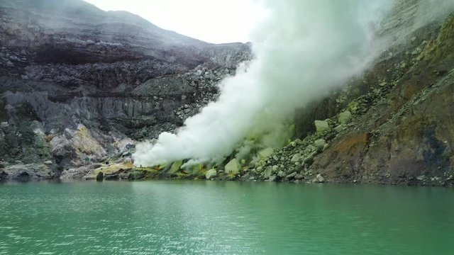 Aerial view of sulfur mine at the crater of Kawah Ijen volcano. East Java, Indonesia.