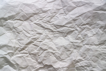 white paper crushed by hand squeeze, for wallpaper, added text