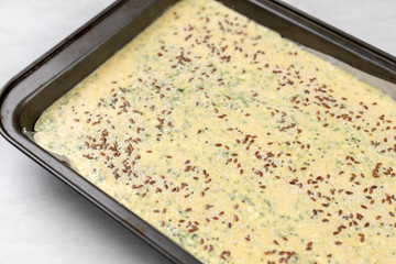 Raw Cornbread prepared for baking in baking tray