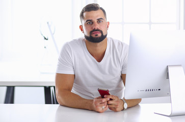Businessman in the office on the phone with headset, Skype