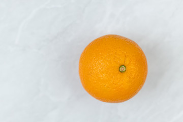Flatlay above Raw Oranges on the grey marble table