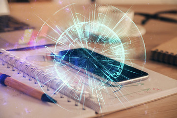 Double exposure of financial theme drawing and cell phone background. Concept of business