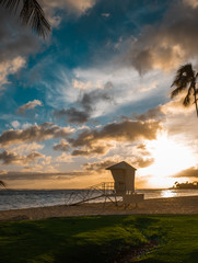 Beautiful sunset at the beach and closed lifeguard tower 
