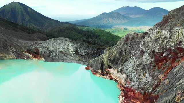 Aerial view of mountain Kawah Ijen volcano with blue acid lake. East Java, Indonesia