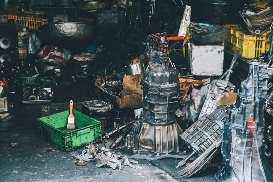 Closeup view of pile of old rusty metal scrap and used spare parts, disassembly. Old car parts suitable for future use. Different old spare parts from cars. Sale of old spare parts from the car.