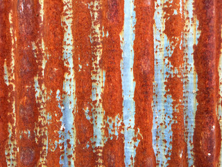 Rust on Galvanized corrugated sheet, rustic background, weathered background. Metal sheet with rusty.