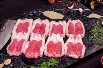 Raw meat on marble background