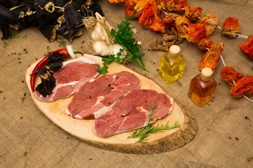 Raw meat on marble background