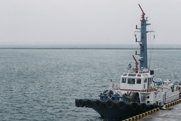 Ship tug docked at the shore of Odessa Sea Port