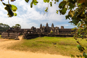 Fototapeta na wymiar Angkor Wat at Siem Reno, Cambodia temple complex in the rainforest of the angkoe district. the national symbol of Cambodia, the main element of the Cambodian flag