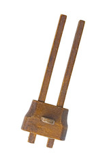 Old woodworking marker gauge tool. Isolated on a white background