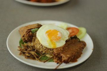 fried rice with satay and egg
