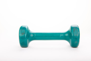 Close up of a worn, used, five pound barbell with scuffs and scratches.