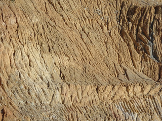 Erosion at ground and slopes is caused by rainfall. The soil structure is weak and there are landslide. Safety measure has been taken in some area.