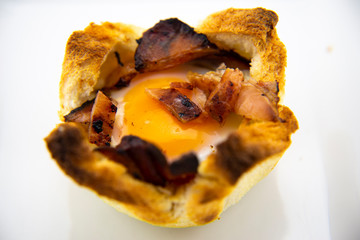 Toast bread with cheese, bacon and egg