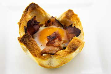 Toast bread with cheese, bacon and egg