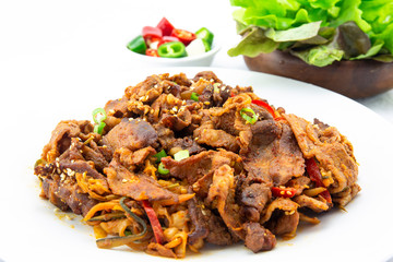 Stir fried with pork and vegetables sprinkle sesame seeds