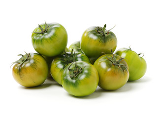 fresh green tomato isolated on white background